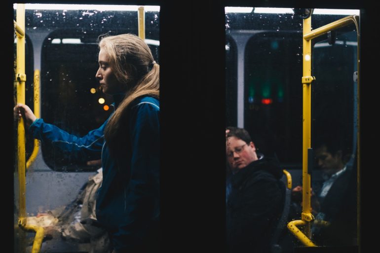 photo-of-a-woman-standing-inside-bus-808700-770x513